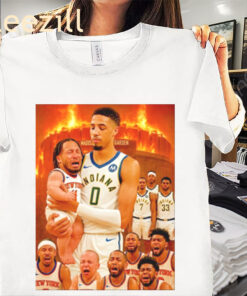 Tyrese Haliburton carring Jalen Brunson Funny Baby NBA Shirt